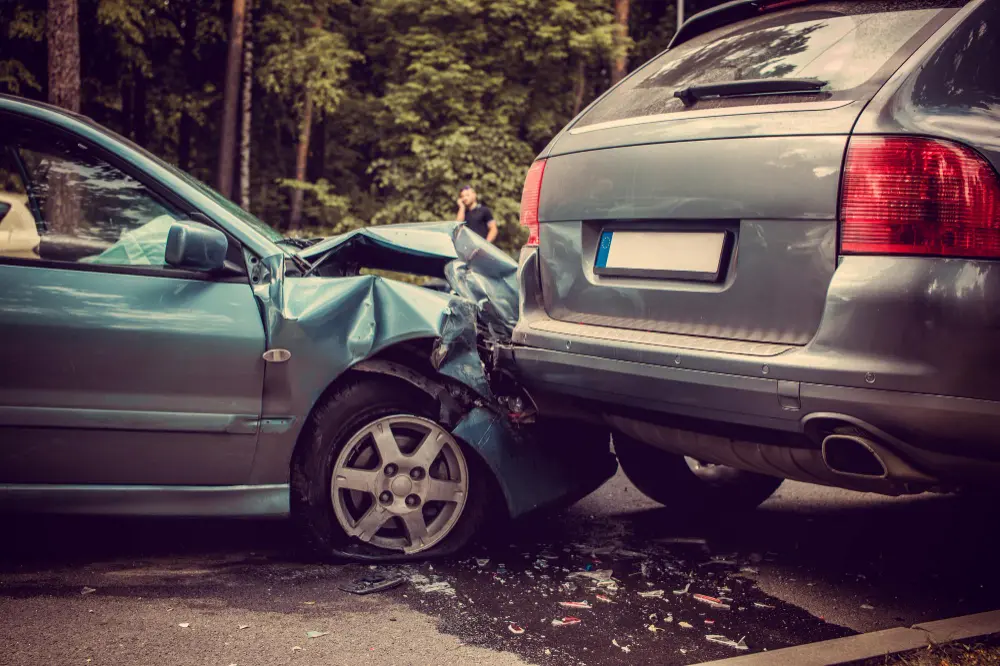 Blue car hitting suv